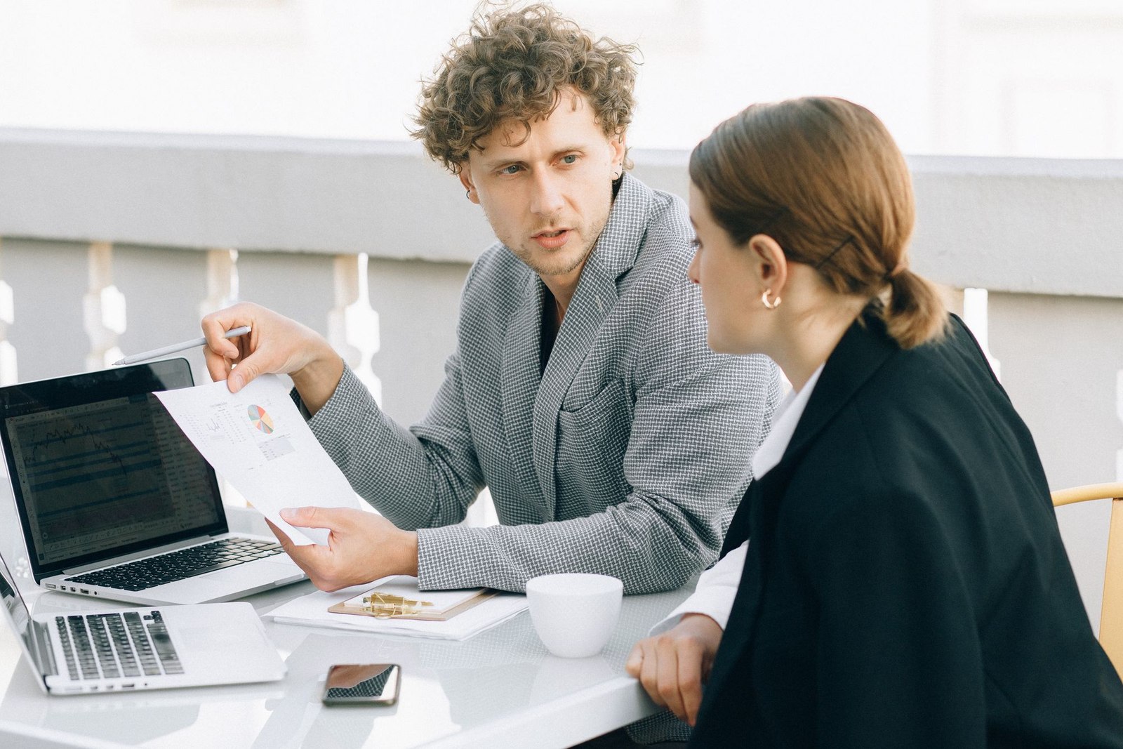 Consultant working side by side with a client